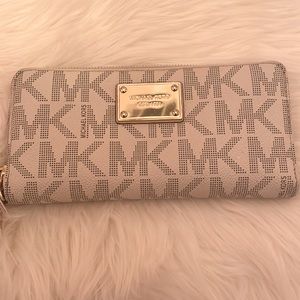 MK beige and brown wallet. Gently used.